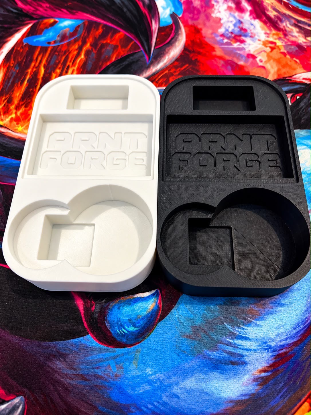 The Original insert in white and in black side by side, both empty.
